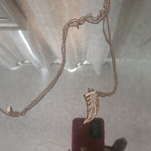 Jennifer Lopez Gold Wing Pendant Necklace